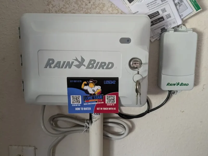 Rain Bird irrigation controller installed on a garage wall