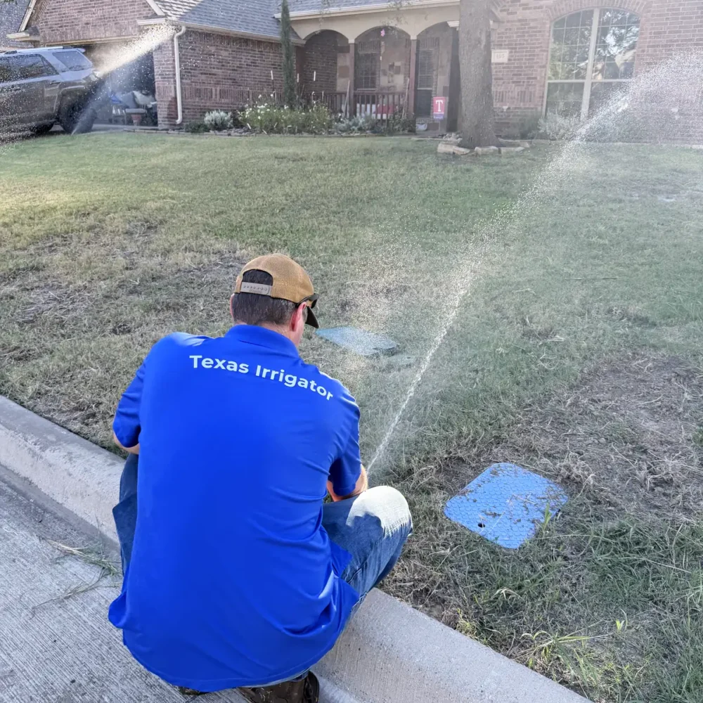 Technician testing rotor coverage across a front lawn